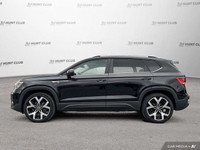 Command attention with the 2022 Volkswagen Taos Highline SUV. This sleek black beauty boasts a panor... (image 2)