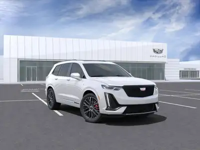 The 2025 Cadillac XT6 AWD Sport in pristine white offers an exceptional driving experience with its...