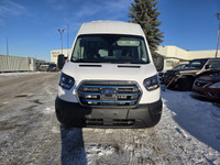 This brand new OXFORD WHITE 2024 FORD E-TRANSIT CARGO VAN is powered by an ELECTRIC ENGINE THAT'S PA... (image 1)