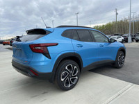Zipping through the streets of Calgary, the 2025 Chevrolet Trax in Summit White is a sight to behold... (image 8)