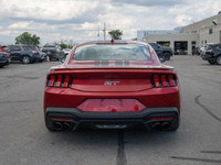 The 2024 Ford Mustang GT delivers iconic muscle car performance wrapped in a sleek, modern package--... (image 6)