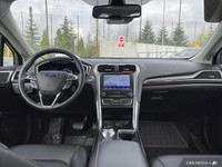 This Ford Fusion Hybrid boasts a Gas/Electric I-4 2.0 L/122 engine powering this Variable transmissi... (image 9)