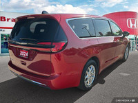 Command attention with this 2024 Chrysler Pacifica Touring-L, boasting a stunning Red Hot Pearl Coat... (image 5)