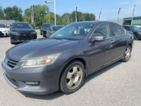 La Honda Accord Touring 2015 est une berline haut de gamme qui allie confort, performance et technol... (image 5)