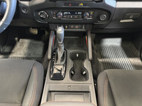 The 2023 Nissan Frontier Pro-4x, available at Moose Jaw Honda, is a robust and reliable truck design... (image 9)