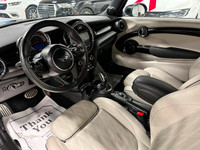 Enjoy a luxurious open-air joyride with our 2020 MINI Cooper Convertible John Cooper Works presented... (image 9)