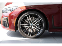 2022 BMW 750i xDrive AWD 8-Speed Automatic V8 EXTERIOR - AVENTURINE RED III METALLIC INTERIOR - COGN... (image 6)