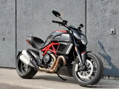 No money down. Credit approved in minutes* OACJust...CLICK HERE The 2011 Ducati Diavel Red Carbon is...