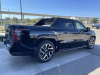 The 2024 Chevrolet Silverado EV RST in Black is a powerful and innovative electric pickup truck. Its... (image 7)