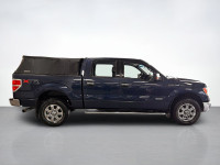 Well-equipped and completely capable, our incredible used 2014 Ford F-150 XLT SuperCrew short bed 4X... (image 5)