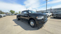 This Ram 3500 is equipped with: Leather-Faced Front Vented 40/20/40 Bench, Power Sunroof, Remote Sta... (image 4)