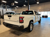 Built strong our 2023 Nissan Frontier S King Cab 4X4 gets going with grit and determination in White... (image 4)
