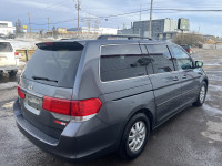 KBB.com 10 Best Used Family Cars Under $15,000. This Honda Odyssey boasts a Gas V6 3.5L/212 engine p... (image 4)
