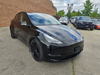 Unleash instant torque and futuristic performance with this 2023 Tesla Model Y Performance—solid bla... (image 7)
