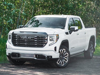 The *2023 GMC Sierra 1500 Denali Ultimate* is a pre-owned powerhouse that effortlessly blends bold d... (image 2)