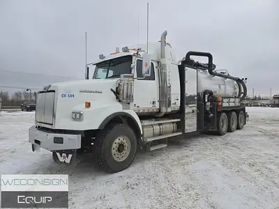 TRI DRIVE DOT COMBO VACUUM TRUCK (unit #01794)... c/w 36in. Stratosphere Sleeper, Located in Fort St...