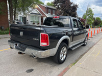 2014 Ram 1500 4WD Crew Cab Laramie Loaded with luxury and power, this full-size pickup features prem... (image 5)