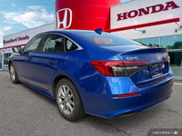 Experience effortless driving with this 2022 Honda Civic Sedan EX, boasting a sleek blue exterior an... (image 3)