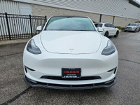 This stunning TESLA MODEL Y WITH UPGRADED LUXURIOUS Pearl White Exterior paint option with the stunn... (image 9)