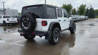 This 2025 JEEP WRANGLER 4-DOOR RUBICON has the following options Cloth Low-Back Bucket Seats, Remote... (image 4)