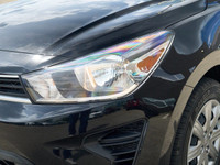 This Kia Rio 5-door delivers a Regular Unleaded I-4 1.6 L/98 engine powering this Variable transmiss... (image 8)