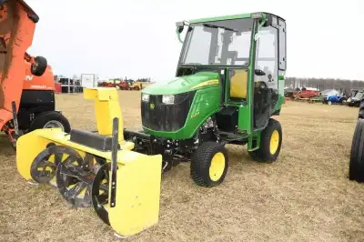 JOHN DEERE 1025R TRACTOR (AS-NEW). 4WD, CAB, COMES WITH FRONT MOUNT JOHN DEERE 54in. QUICK HITCH SNO...
