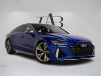 This 2022 Audi RS 7 in striking blue is a Canadian vehicle with a clean Carfax and remaining factory... (image 1)