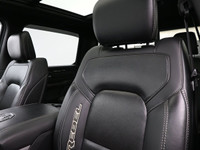 The 2021 Ram 1500 Rebel is a bold, off-road-focused full-size truck with a 5.7L HEMI V8 producing 39... (image 7)