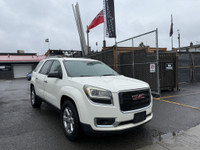This 2014 GMC Acadia SLE-2 is a spacious and reliable SUV with a sleek white exterior and a comforta... (image 6)