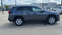 This Toyota RAV4 is equipped with: Cloth Seat Trim, Heated front seats, AM/FM radio: SiriusXM, Radio... (image 9)