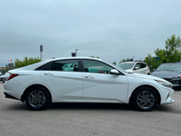 WAS: $21995 NOW: $21285 plus taxes and licensing feesCeramic White 4D Sedan I4 CVT FWD | Heated Seat... (image 4)