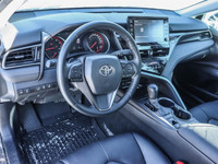 CAMRY XSE FEATURES AWD, 19-INCH WHEELS, AND DUAL EXHAUST. INSIDE, IT OFFERS A LEATHER-TRIMMED INTERI... (image 8)
