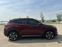 THIS 2020 HYUNDAI TUCSON ULTIMATE COMES IN A BEAUTIFUL BURGUNDY FINISH AND IS READY FOR ITS NEXT HOM... (image 4)