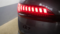 This Audi Q7 has a powerful Intercooled Turbo Gas/Electric V-6 3.0 L/183 engine powering this Automa... (image 9)