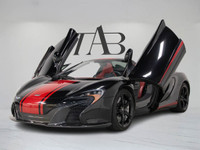 This clean Carfax, Ontario 2015 McLaren 650S Spider is a thrilling low-kilometre supercar finished i... (image 2)