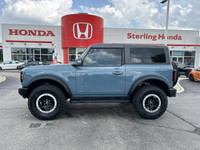 This 2023 Ford Bronco Outer Banks is a head-turner, boasting a Velocity Blue Metallic exterior and a... (image 7)