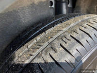 This Ford Escape has a strong Intercooled Turbo Regular Unleaded I-3 1.5 L/91 engine powering this A... (image 7)