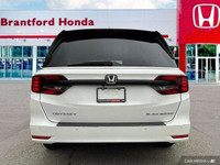 This 2023 Honda Odyssey Black Edition boasts a luxurious Platinum White Pearl exterior and a strikin... (image 4)
