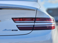 Experience the impressive 2023 Genesis G80 2.5T Advanced, a stunning white all-wheel-drive sedan tha... (image 4)