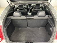 Looking for a sporty and stylish ride with a touch of practicality? Look no further than this 2013 H... (image 5)