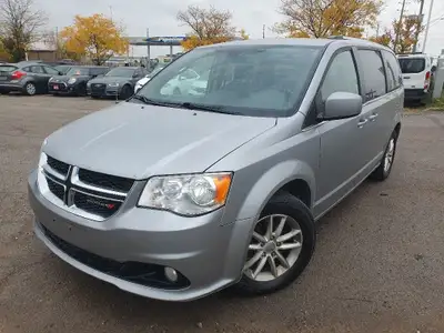 2018 Dodge caravan with 7 riders backup camera , stow n go PL, PW, AC . The prices is $ 8999 uncerti...