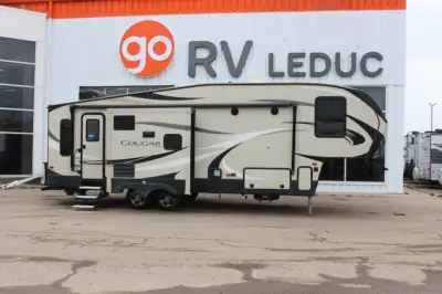 Keystone Cougar Half-Ton Series fifth wheel 27RLS highlights: Tri-Fold Sleeper Sofa Pop-Up TV Kitche...