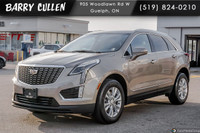 The 2023 Cadillac XT5 FWD Luxury in an elegant tan hue with its nimble front-wheel drive is all abou... (image 8)