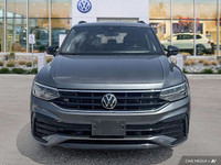 This Volkswagen Tiguan boasts a Intercooled Turbo Regular Unleaded I-4 2.0 L/121 engine powering thi... (image 7)
