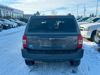 Ready to conquer any terrain? The 2015 Jeep Patriot North 4x4 is your ultimate off-road companion. W... (image 3)