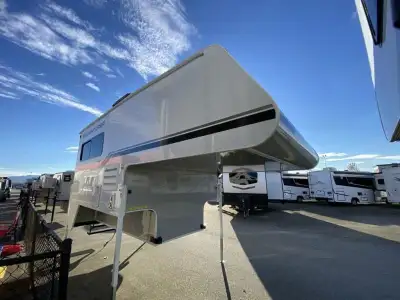 Adventurer LP (ALP) Adventurer 89RB truck camper highlights: Dream Dinette Wet Bath Queen Bed Three...