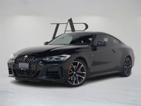 This 2021 BMW 4 Series M440i Coupe blends exhilarating performance with elegant design, featuring th... (image 2)