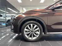 The 2021 Infiniti QX50 Luxe presents a compelling combination of power and sophistication with its e... (image 4)