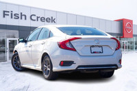 The 2021 Honda Civic EX is a stylish and efficient compact sedan that offers a smooth ride, modern t... (image 3)