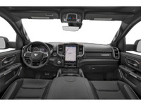The 2026 Ram 1500 Laramie in a striking black exterior, matched with a robust 4x4 drivetrain, delive... (image 4)